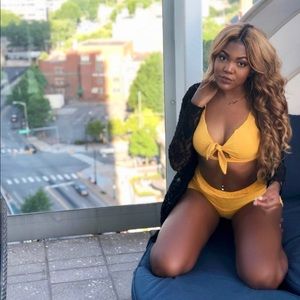 Yellow two piece cut out crop top matching shorts